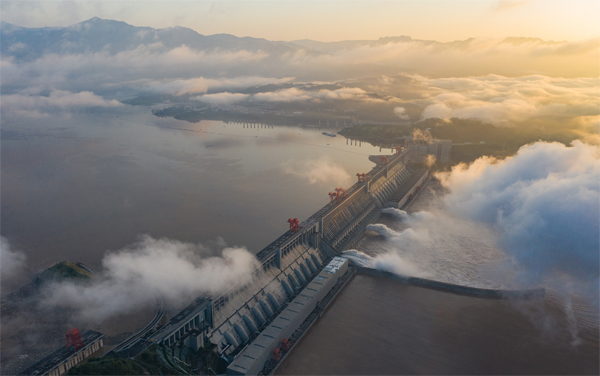 FILE--Floodwaters gush out of the Three Gorges Dam during a flood discharge  operation in Yichang city, central Chinas Hubei province, 11 September 2  Stock Photo - Alamy