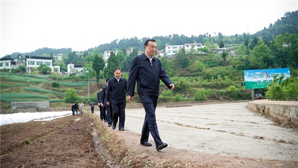 Premier inspects farmlands, healthcare, education in SW China